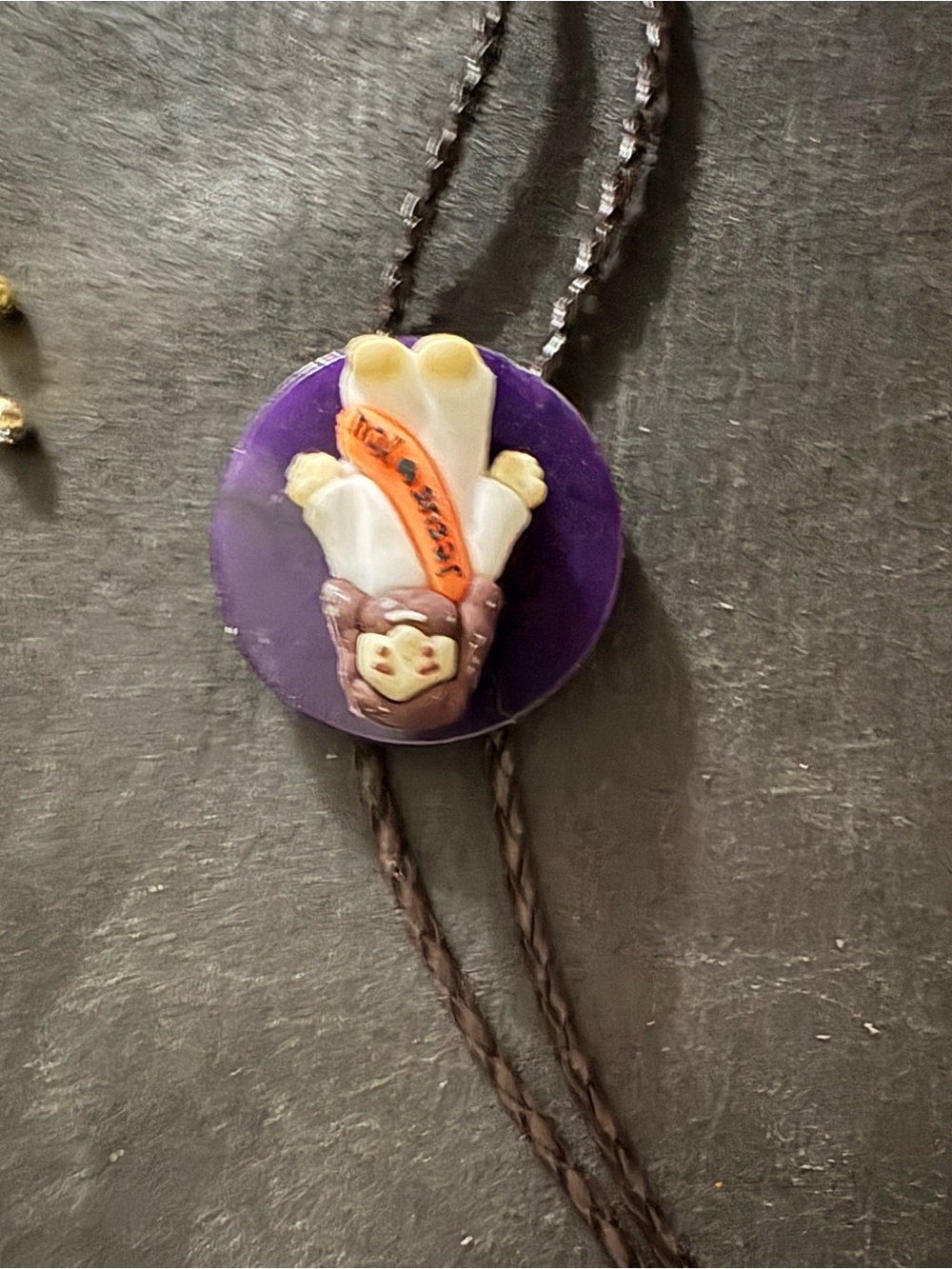Purple Novelty Bolo Tie with Character Medallion